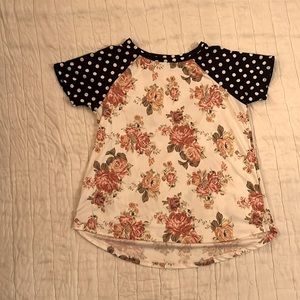 Floral body with navy polka dot sleeves